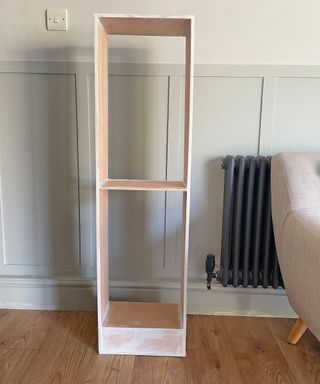 DIY bookcase being built with tools