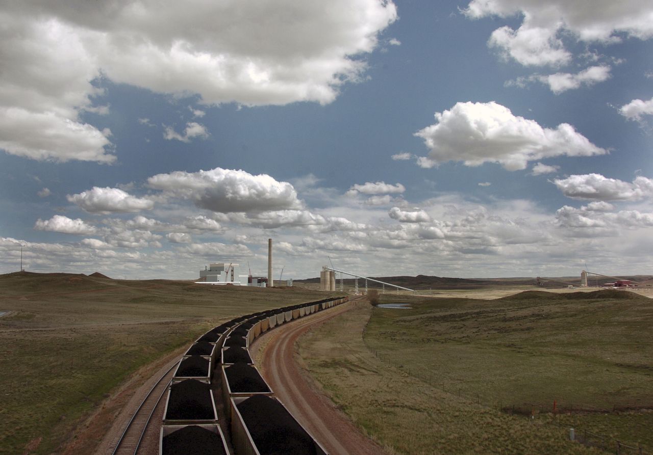 A pair of coal trains travel through Gillette, Wyoming.