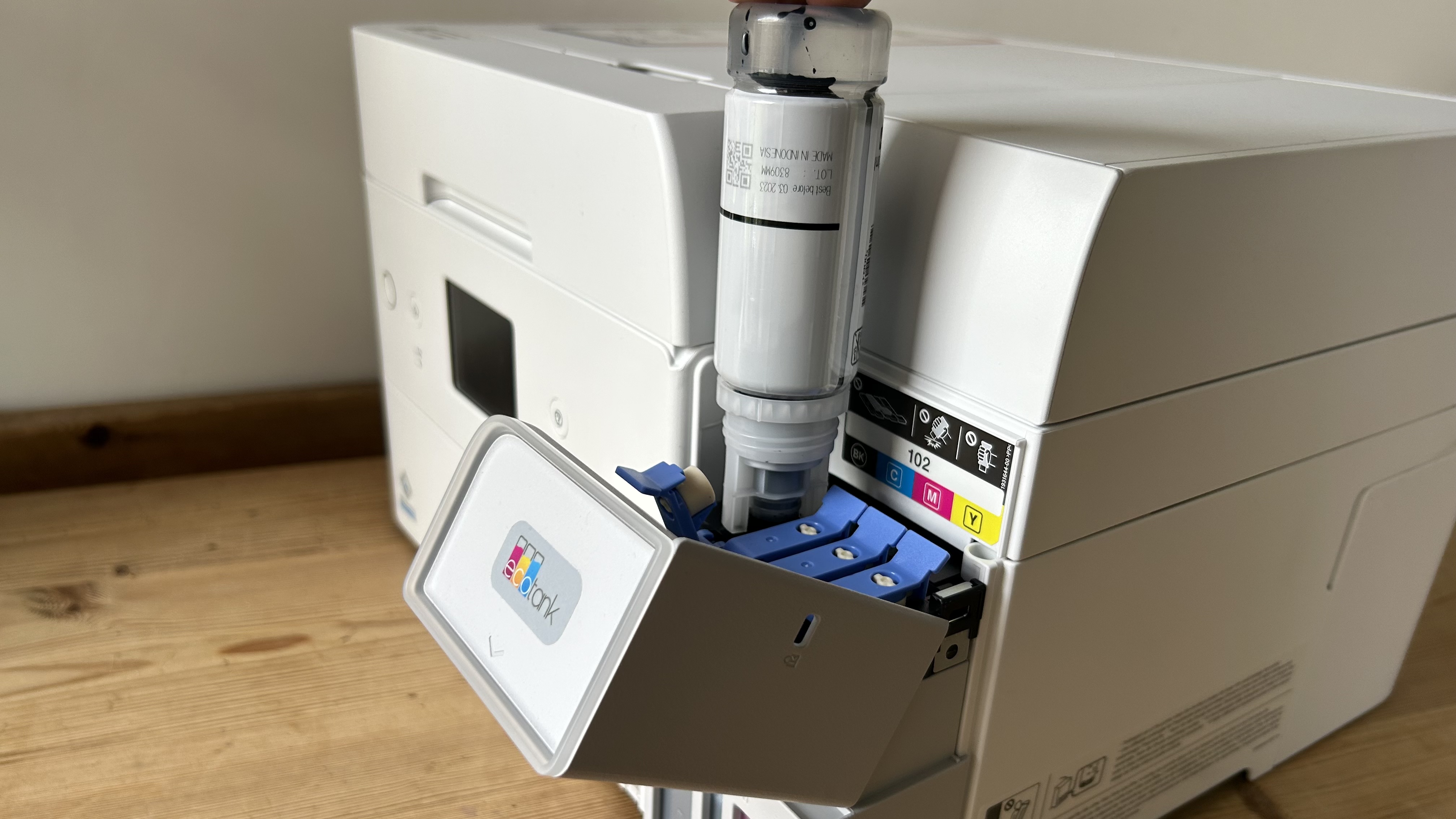 The Epson EcoTank ET-4950 series ink tank printer undergoing testing in a home office during our review process