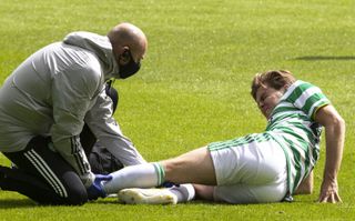 James Forrest receives treatment during a pre-season friendly with Ross County