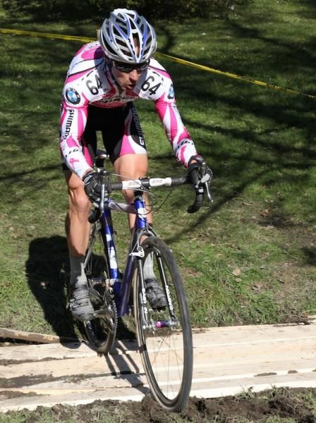 Derrick St. John (Garneau-Club Chaussures-Ogilvy) on the boards