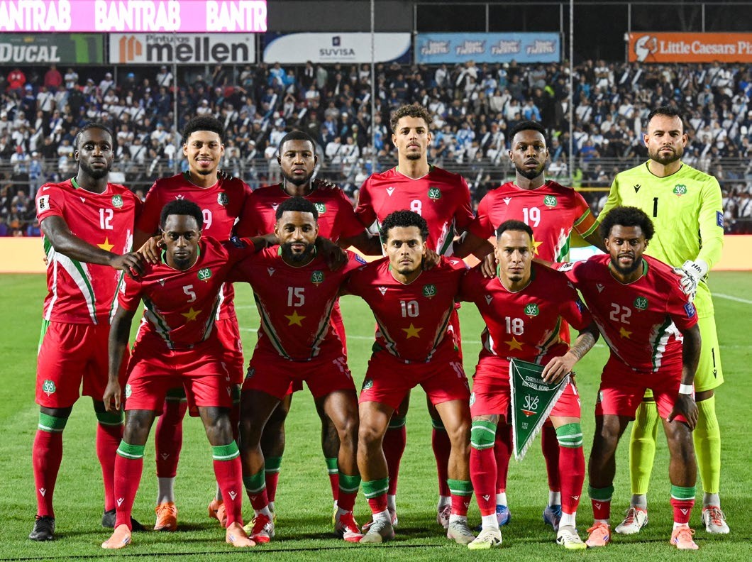 Suriname team before the 2026 FIFA World Cup Concacaf qualifier football match between Guatemala and Suriname at the Manuel Felipe Carrera stadium in Guatemala City on November 18, 2025. (Photo by Johan ORDONEZ / AFP) (Photo by JOHAN ORDONEZ/AFP via Getty Images)