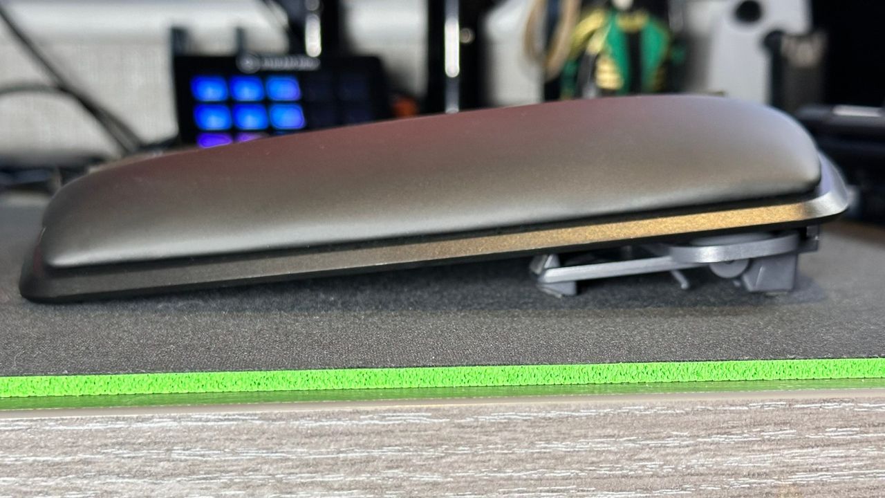 A side view photograph of the Kinesis Gaming Freestyle Edge RGB Plus ergonomic keyboard, showing the lift kit set to 5 degrees