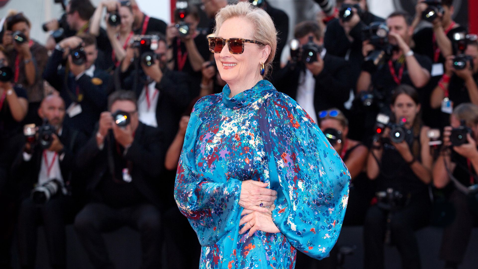 Meryl Streep dazzles in a blue sequinned outfit and shades