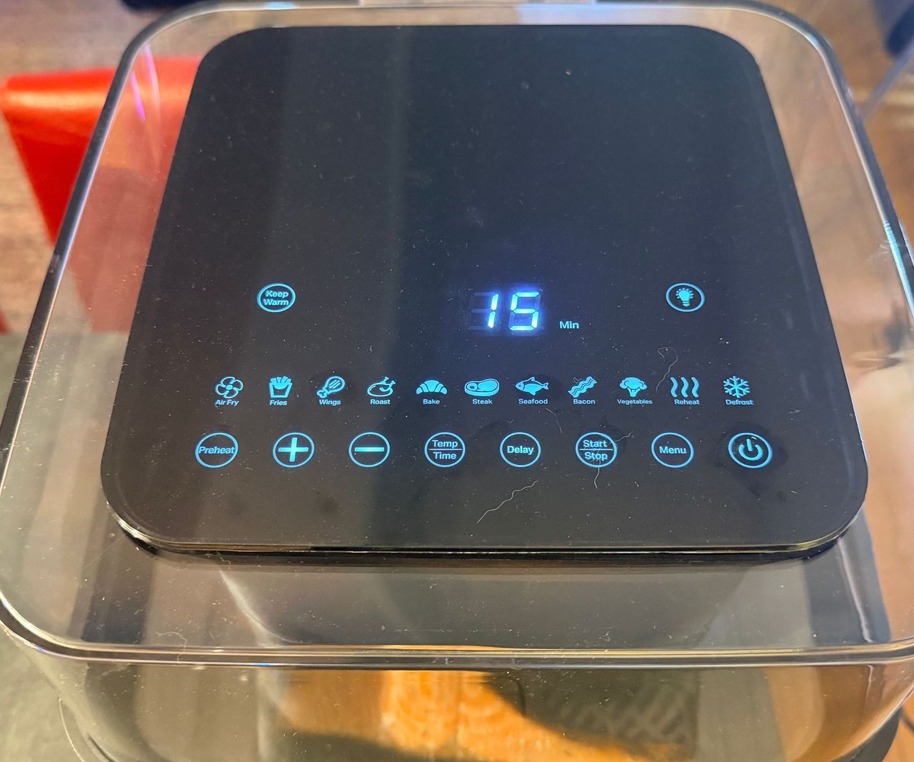The GreenPan Bistro 360 Air Fryer viewed from above showing the timer on 15 minutes