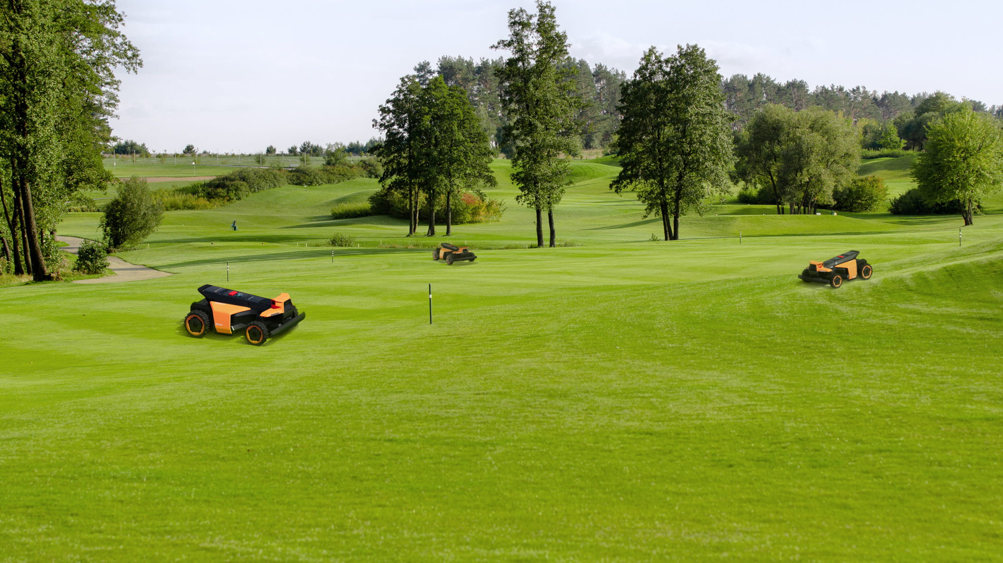 Segway Navimow Terranox Series lawn mowers cutting golf range.