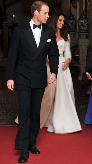 Prince William and Kate leave Clarence House to go to Buckingham Palace for their wedding reception in 2011