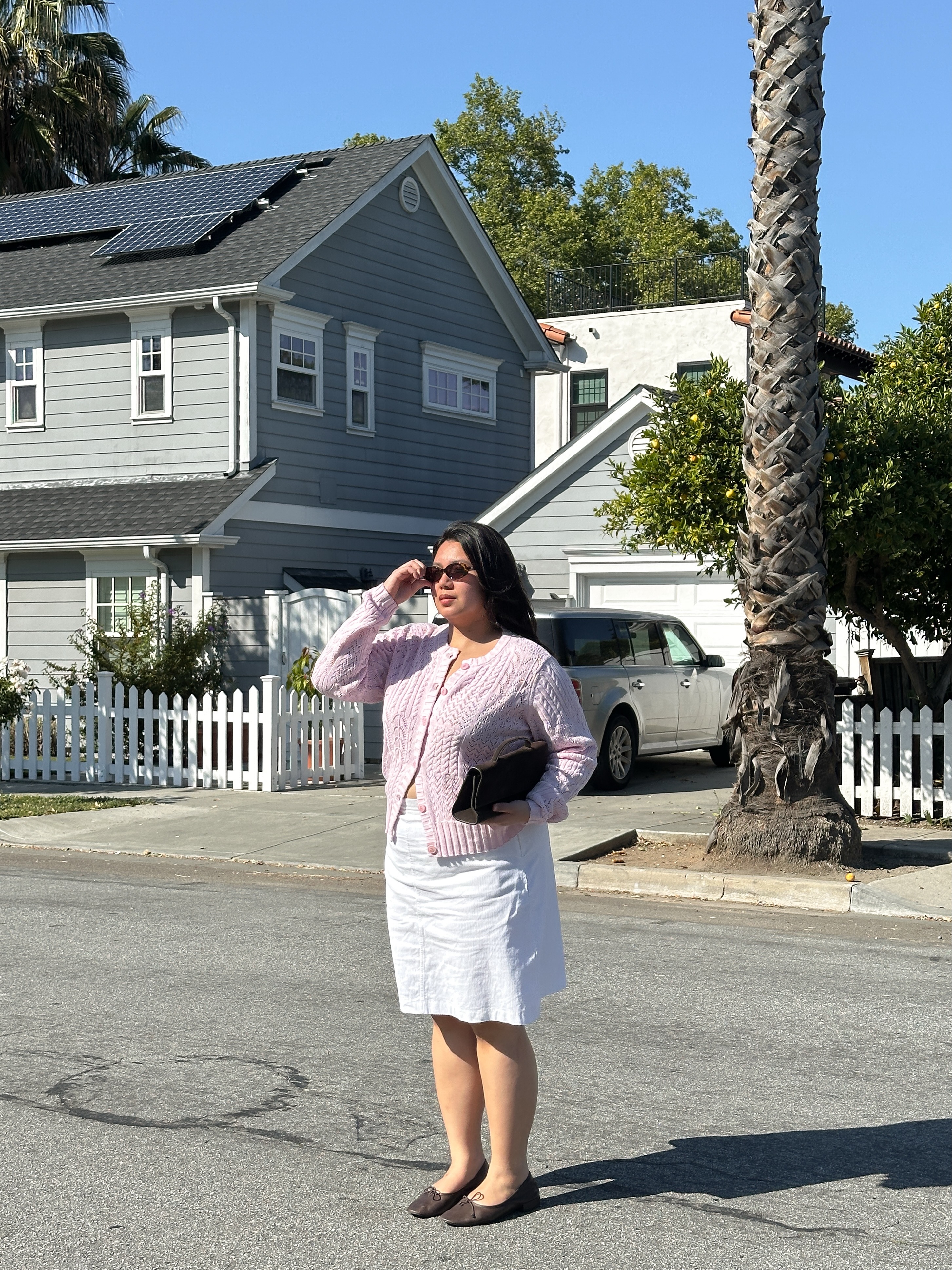 A woman wearing best white linen fashion item for summer 2026.