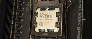 An AMD Ryzen 9 7950X3D sloted into a motherboard