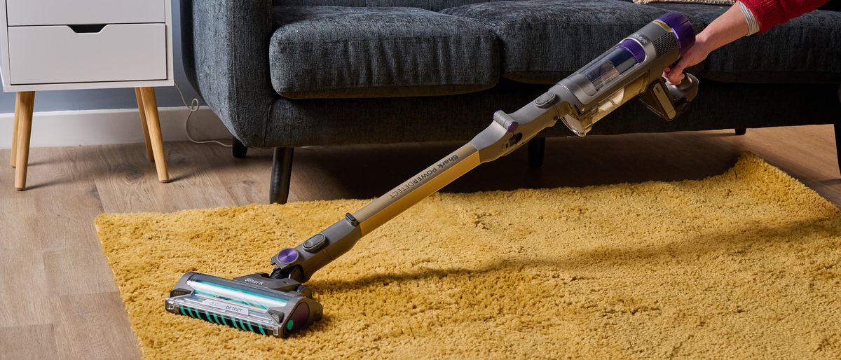 Shark PowerDetect cordless vacuum in living room