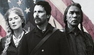 Hostiles Rosamund Pike Christian Bale Wes Studi lined up in black and white against the American fla