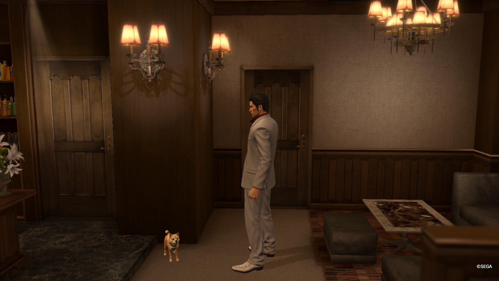 Kiryu stands beside a dog in Yakuza Kiwami