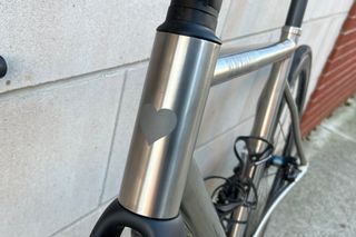 The Blackheart Road Ti has a 135mm tall head tube set at 73° with some subtle branding.
