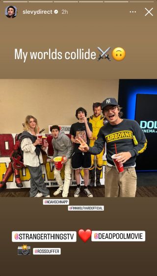 The cast of Stranger Things posing with Wolverine at the movies