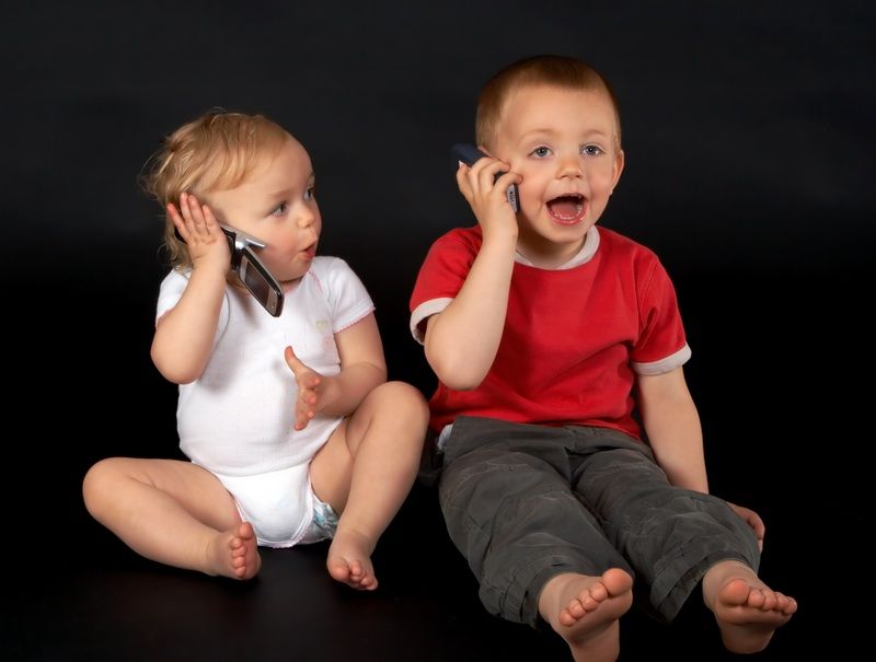 Kids talking on the phone