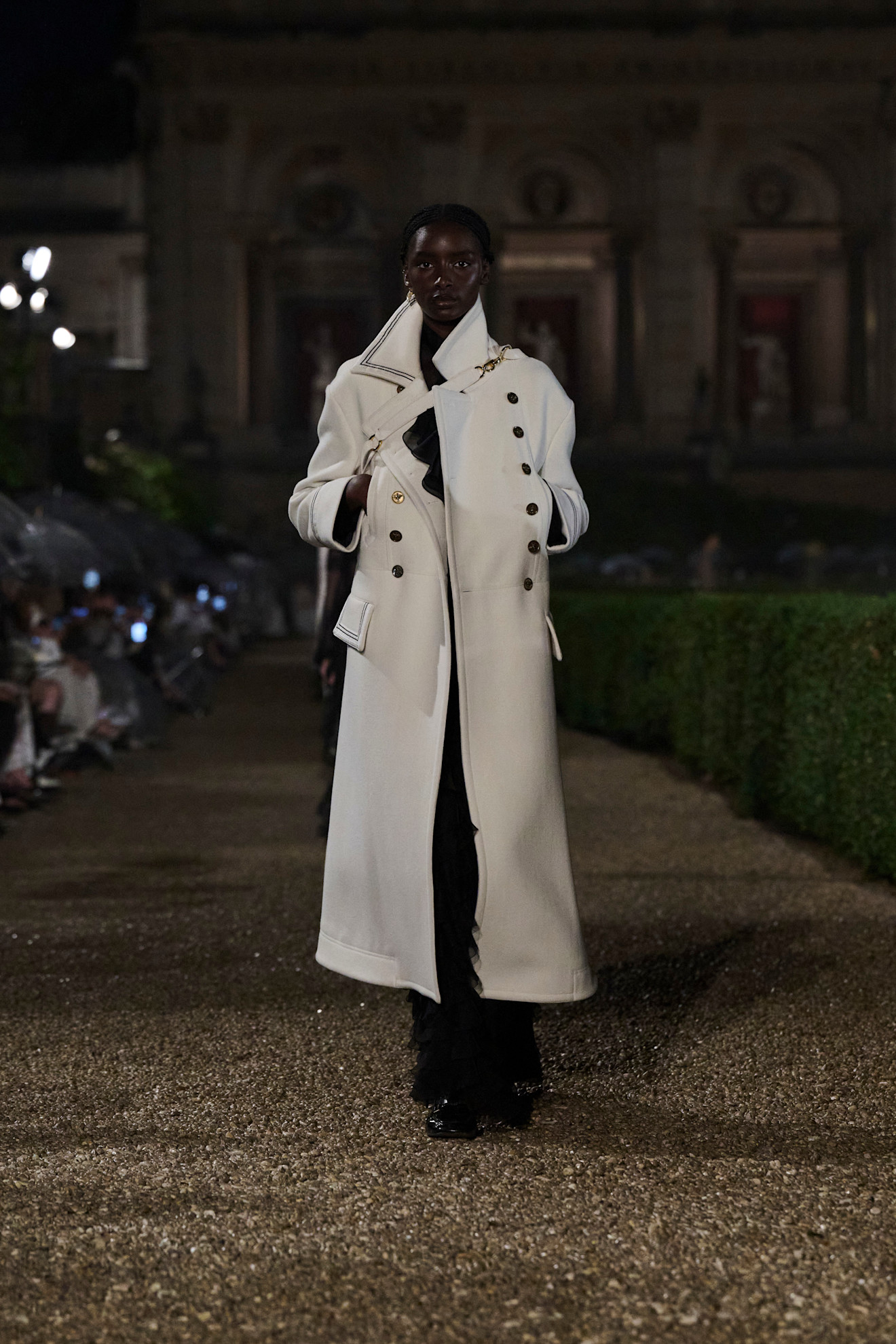 A model wore a similar white coat on the Dior Resort 2026 runway