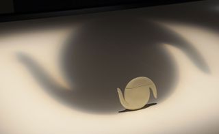 Shadow of the swooping arms of Bakker’s teapot