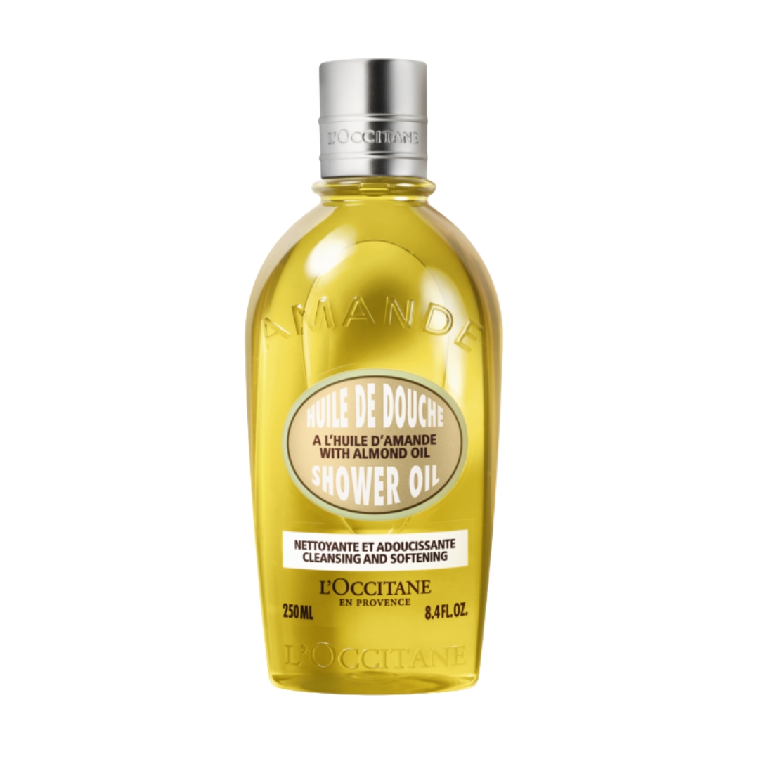 A product shot of the L&#039;Occitane Almond Shower Oil, pictured on a white background