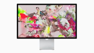 Apple Studio Display on grey background
