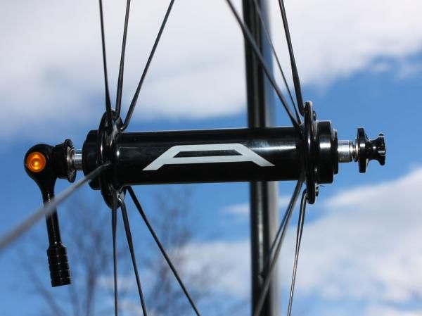The front hub flanges and bearings are widely spaced.
