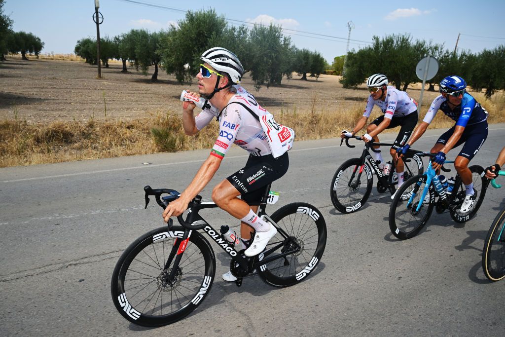 SEVILLE SPAIN AUGUST 21 Joao Almeida of Portugal and UAE Team Emirates cools off during La Vuelta 79th Tour of Spain 2024 Stage 5 a 177km stage Fuente del Maestre to Seville UCIWT on August 21 2024 in Seville Spain Photo by Dario BelingheriGetty Images