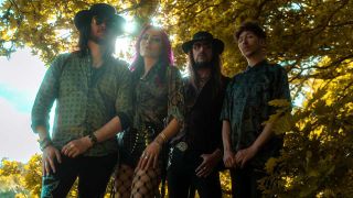 Star Circus standing in front of a tree