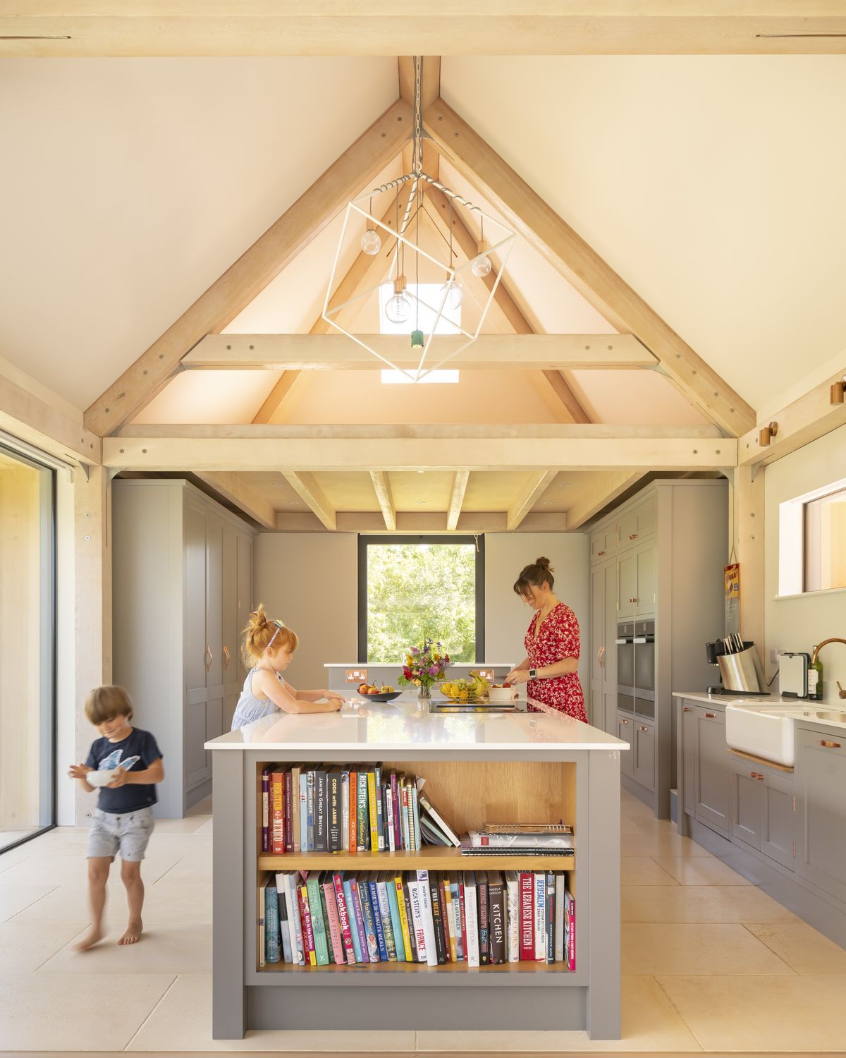 Lizzie works for a food program so she knew exactly how she wanted the kitchen to be laid out, including the hob on the island opposite the breakfast bar for a more social space, and large larder cupboards to provide plenty of storage.