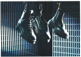 syn branding work Dr Marten shoes hung up