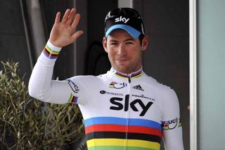 Mark Cavendish (Sky) salutes from the podium.