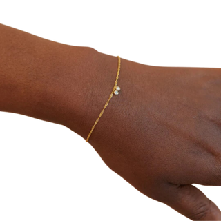 tried and tested gifts: arm with a welded gold bracelet