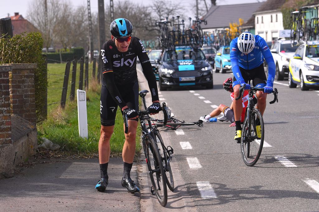 Christian Knees (Team Sky) gets up after a crash