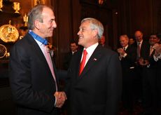 Michael Cox and Chilean president Sebastian Pinera