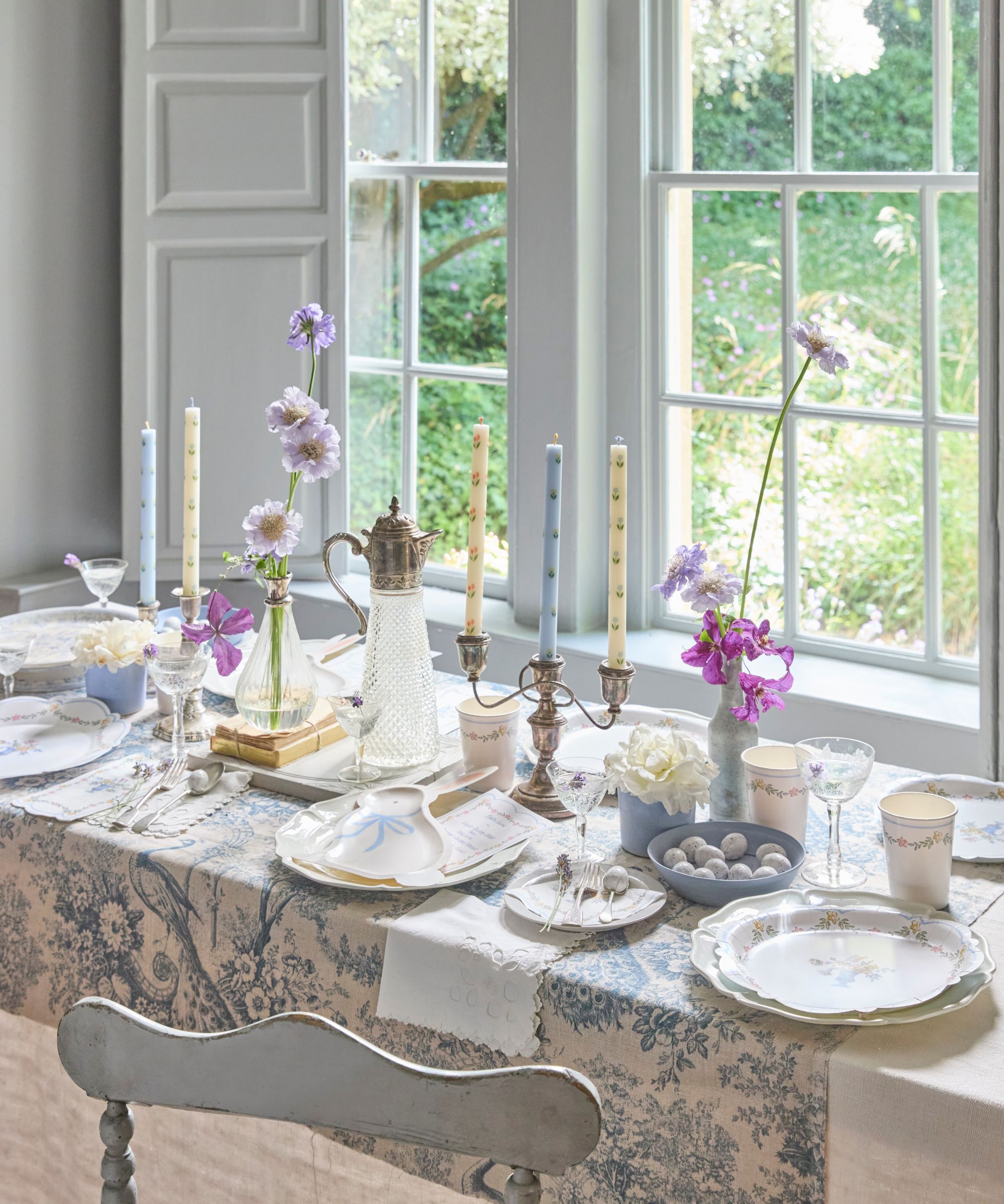 Meri Meri blue and white Easter tablescape with painted candles