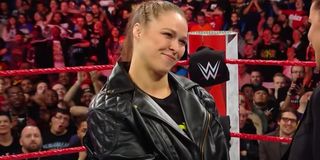 Ronda Rousey giving a fake smile in WWE