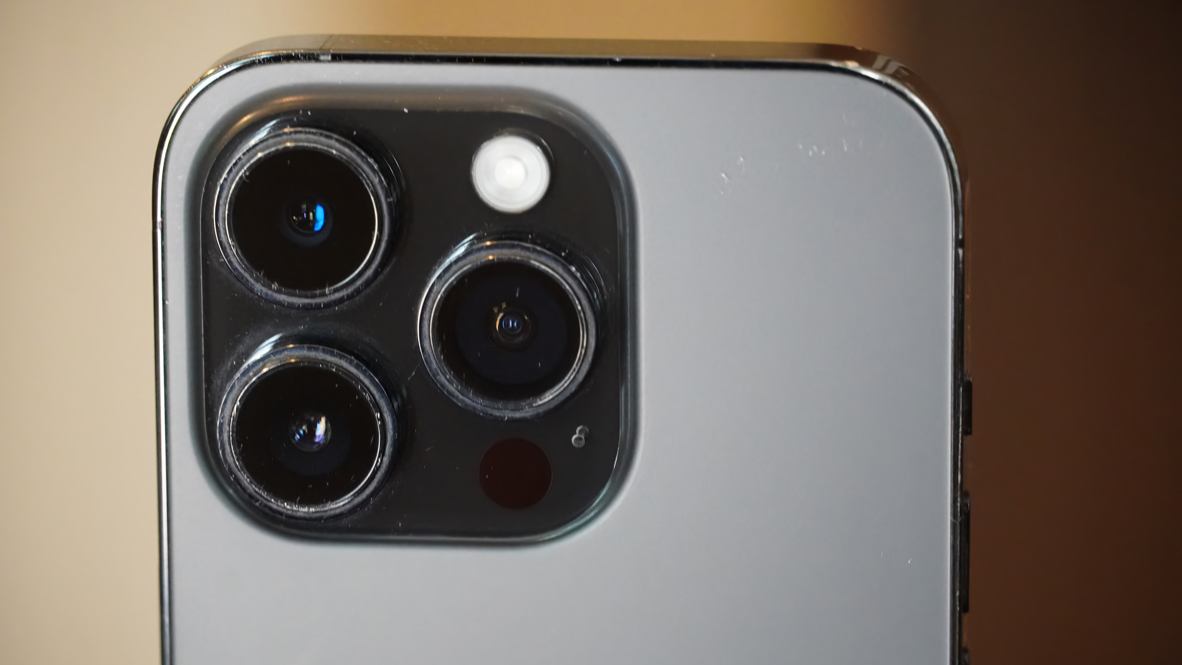 The camera bump of my dad's iPhone 14 Pro after using the Otterbox Mobile Device Care Kit.