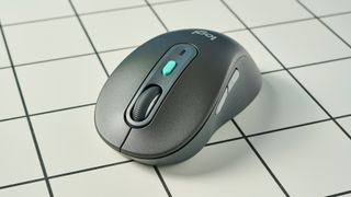 A black Logitech Signature AI Edition M750 wireless mouse