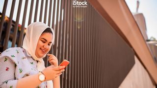 iStock image - Girl on phone