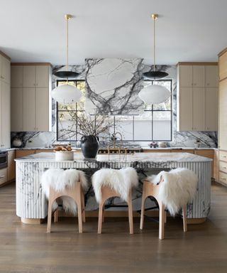 marble kitchen with fluted island