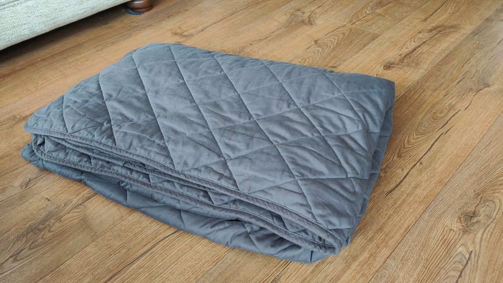 I've used a weighted blanket for over a year — and it's changed the way I sleep Tom's Guide
