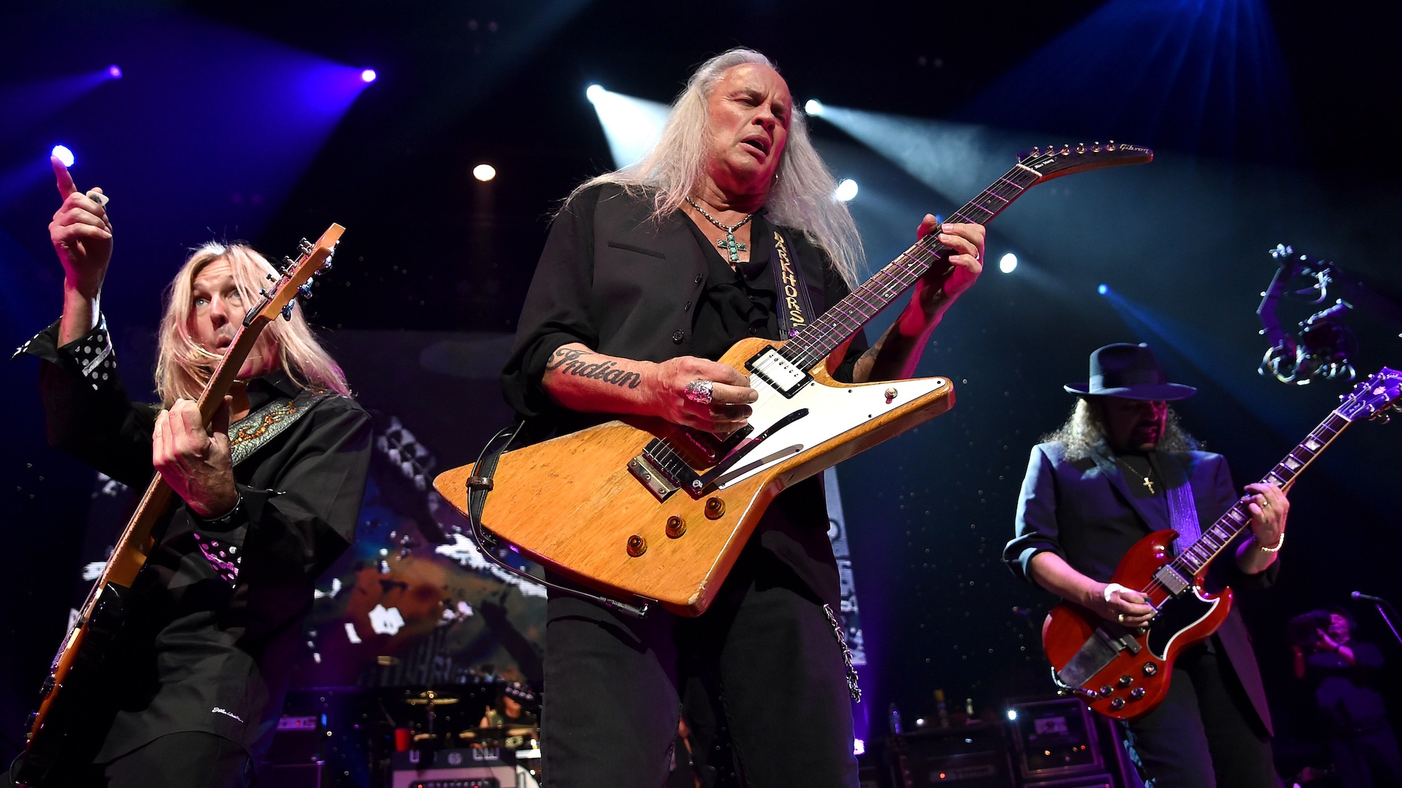 (from left) Mark Matejka, Rickey Medlocke, and Gary Rossington of Lynyrd Skynyrd perform onstage at The Fox Theatre in Atlanta, Georgia on November 12, 2014