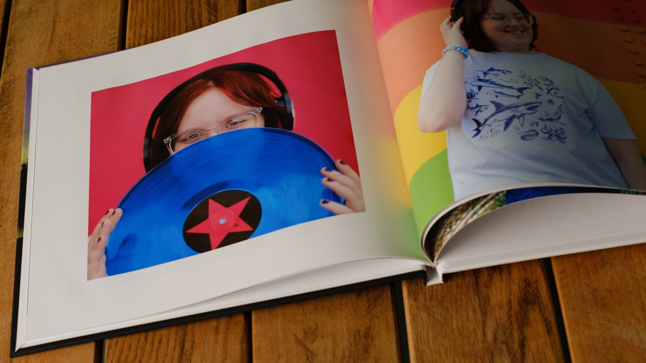 Mixbook photo books on a desk