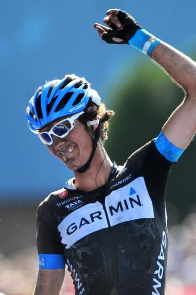 A tired Van Summeren raises an arm in celebration