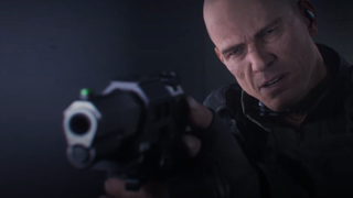 Man holding a gun at the protagonist 