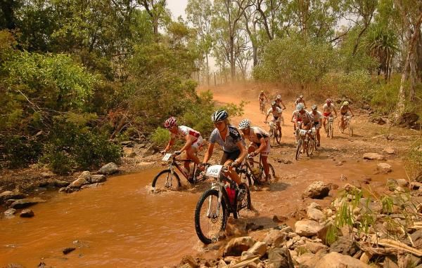 Monique Zeldenrust leads a group across a creek crossing