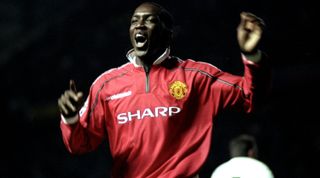 10 Jan 1999: Dwight Yorke of Manchester United celebrates his goal in an FA Carling Premiership match against West Ham played at Old Trafford in Manchester, England. The match finished in a 4-1 victry for Manchester United. \ Mandatory Credit: Shaun Botterill /Allsport