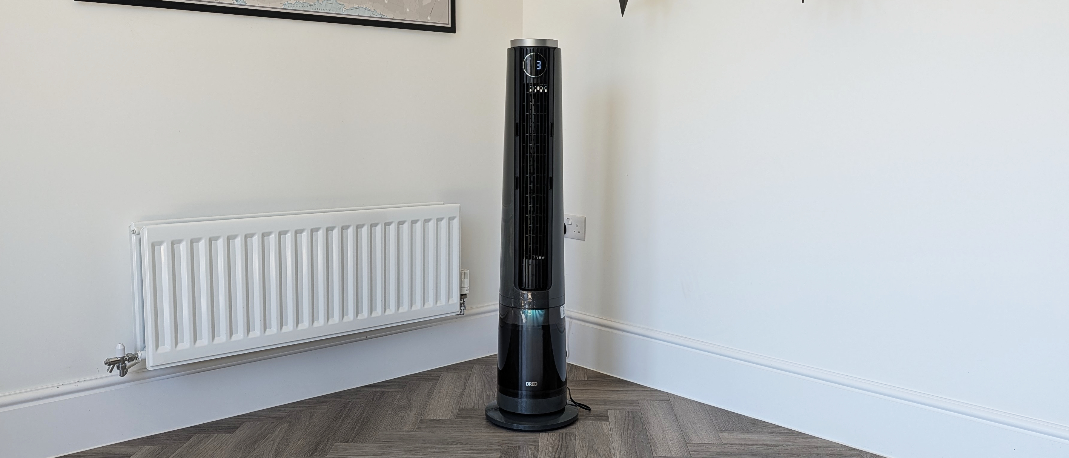 The Dreo Smart Misting Fan 765S in the corner of a room.