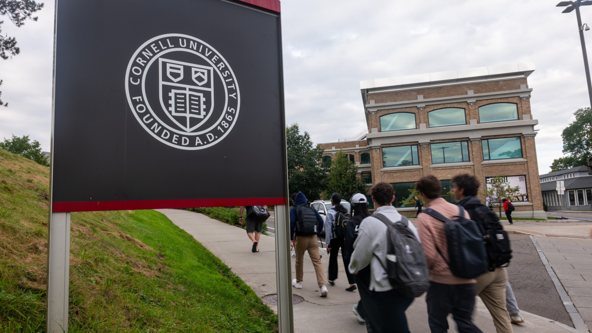 Students walk on the campus of Cornell University in Ithaca, New York. 