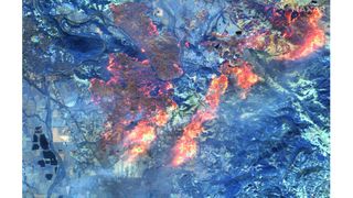 A shortwave infrared satellite image shows the fire lines near Healdsburg, California, on Oct. 27.
