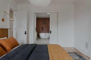 A bedroom with ensuite