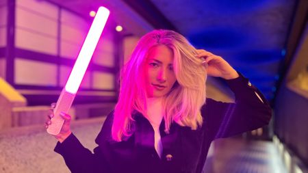 Zhiyun Fiveray FR100C light wand being held by blond woman